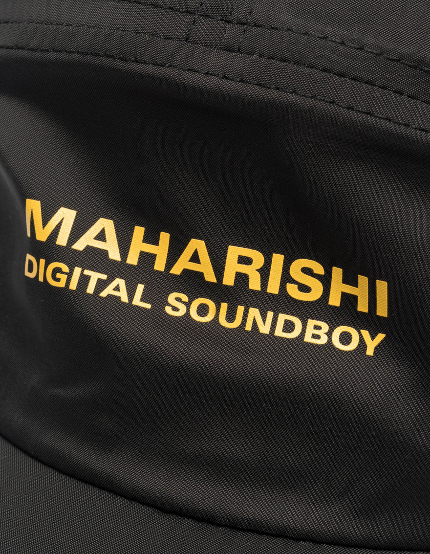 Black bag with 'MAHARISHI DIGITAL SOUNDBOY' text in yellow on a close-up view.
