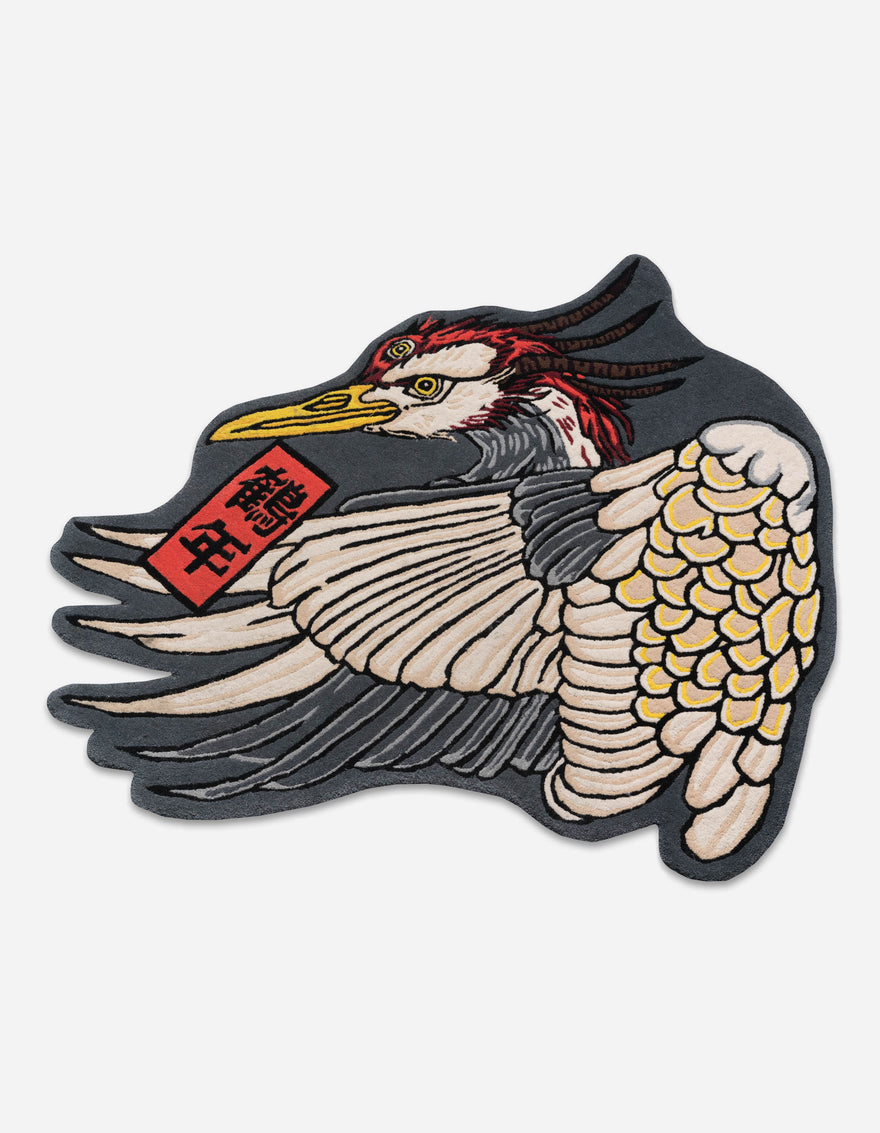 Embroidered patch of a bird with a red tag on a white background