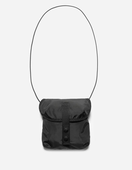 Black shoulder bag with a strap on a white background