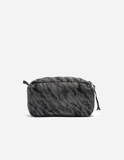 A gray neoprene cube storage pouch with a camouflage pattern, featuring a zipper closure and a small loop on one end.