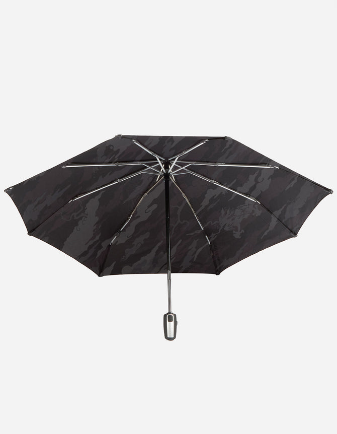 Black umbrella on a white background