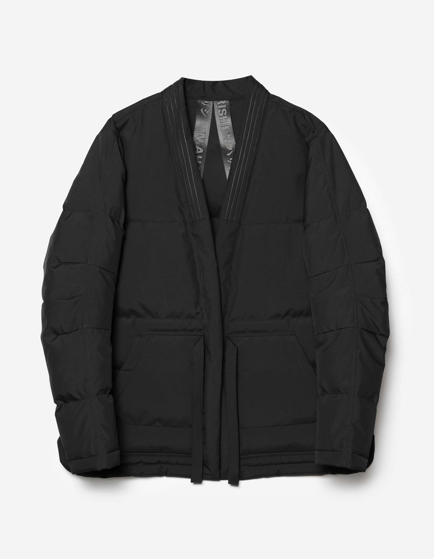 A black padded kimono-style jacket with front tie closure, made from recycled ripstop nylon with horizontal baffles.