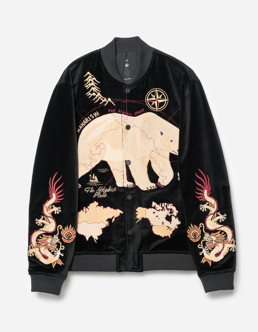 A black cotton velvet MA-1 tour jacket with hand-machine embroidery featuring polar bears, dragons, and arctic maps, along with various texts and designs.