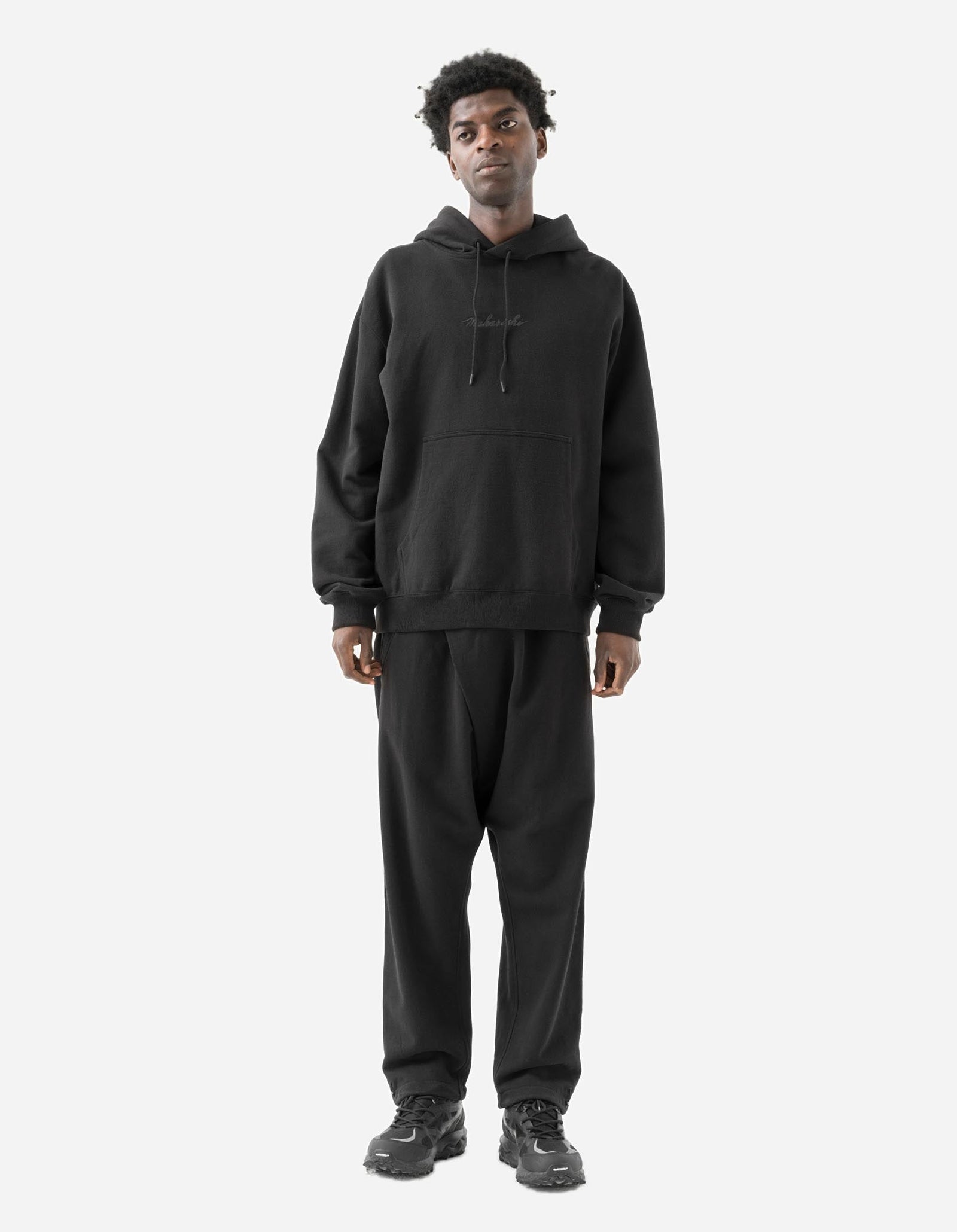 7091 Bering Strait Embroidered Asym Sweatpants Black