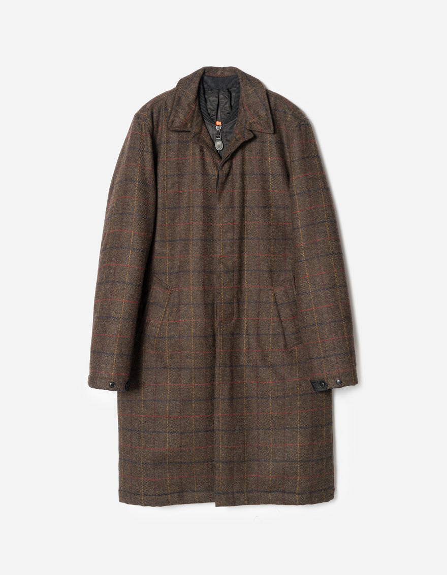 Brown checkered coat on a light gray background