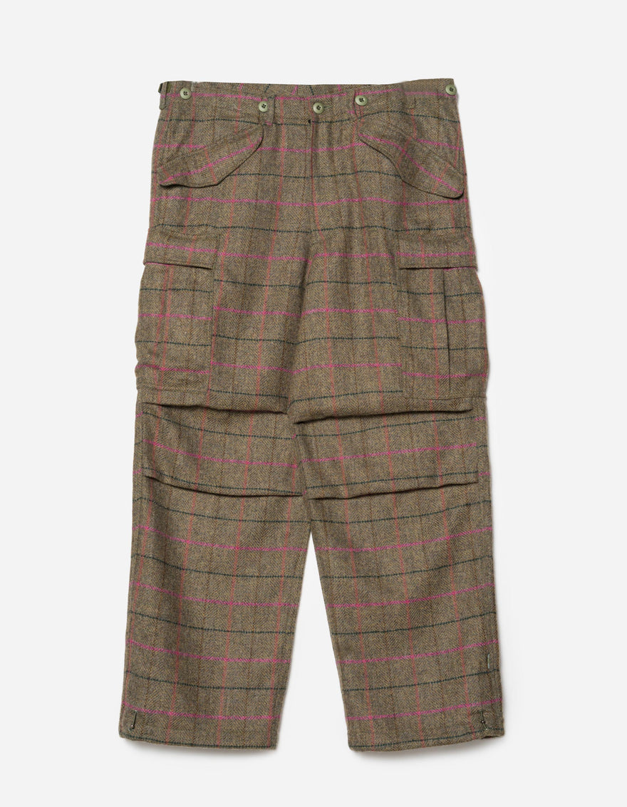Loose fit cargo pants with a wool check pattern in olive and red colors, featuring two cargo leg pockets, a cinchable belt loop waist, and articulated knee shape.