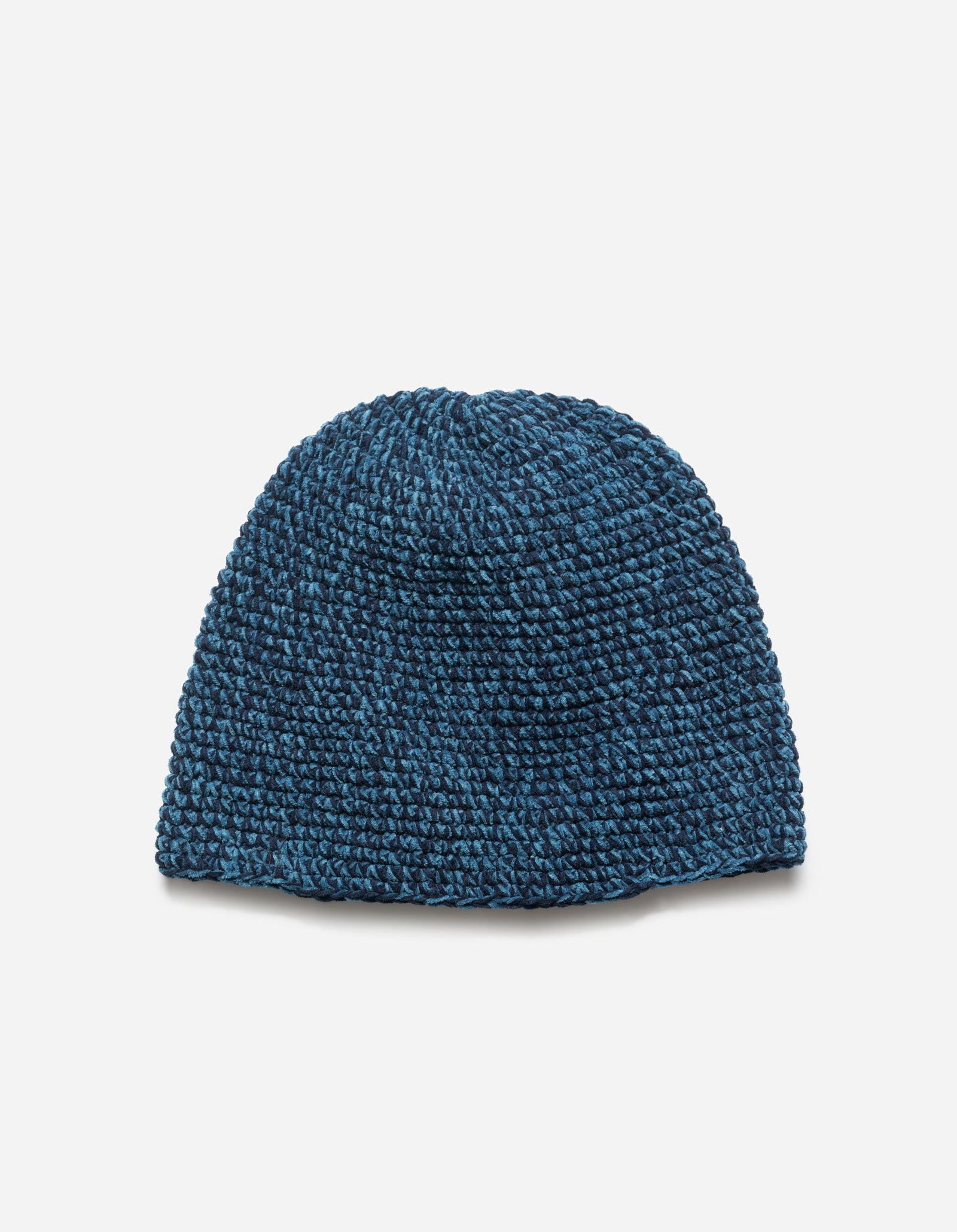 Blue knitted beanie on a light gray background