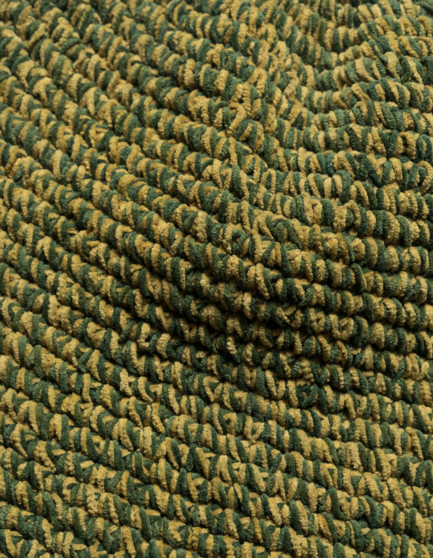 Close-up of green textured carpet