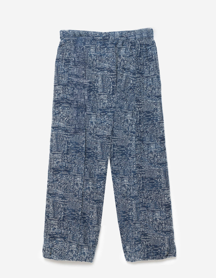 Blue patterned pants on a white background