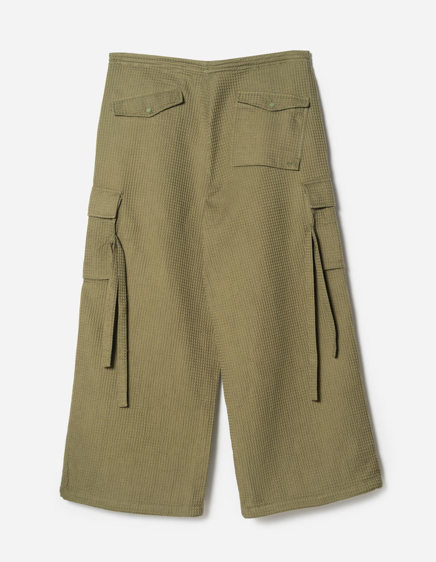 Green cargo pants on a white background