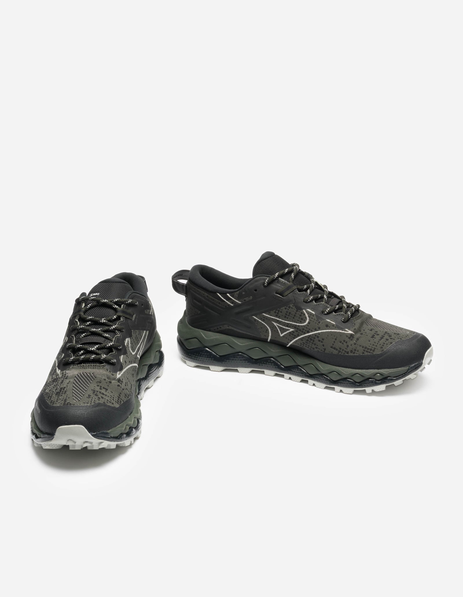 Pair of gray athletic shoes on a white background