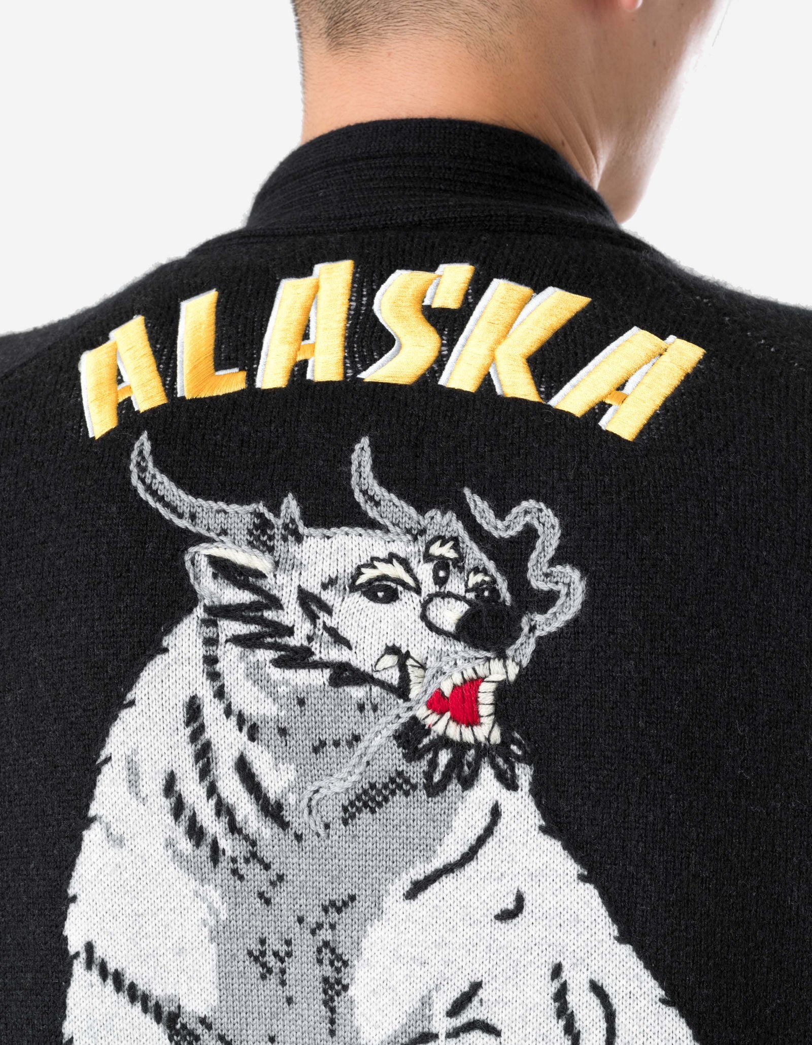 Black jacket with embroidered design of a bear and 'Alaska' text on a white background