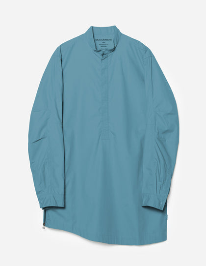 Teal long-sleeve shirt on a light gray background