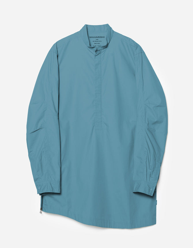 Teal long-sleeve shirt on a light gray background