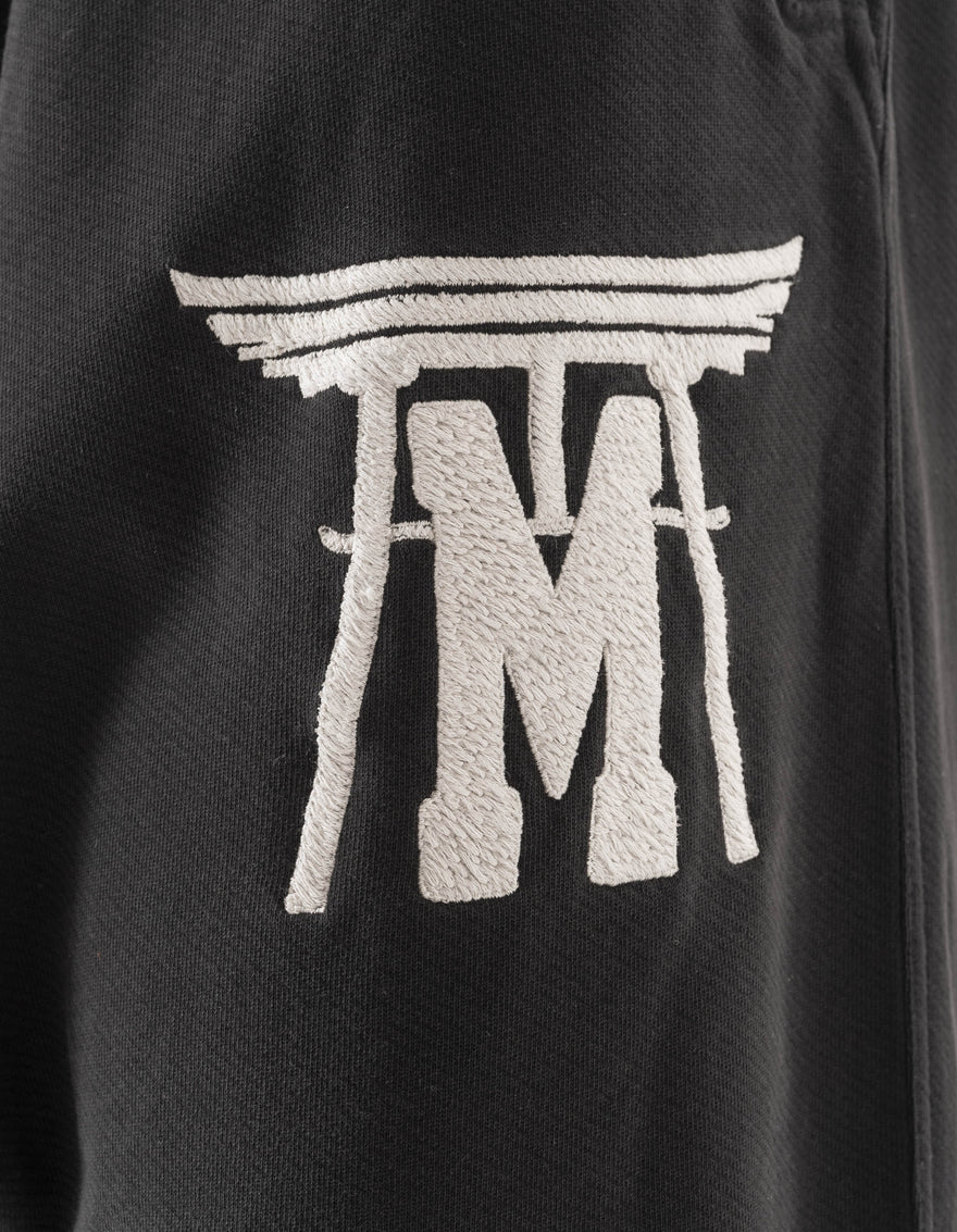 Black sweatshirt with a white logo on the chest